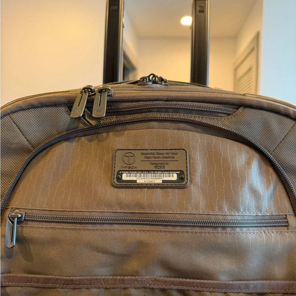 Tumi Brown Backpack with Multiple Compartments